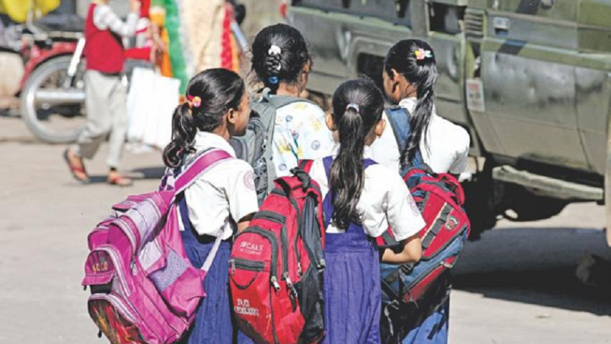 children_carry_heavy_schoolbags.jpg