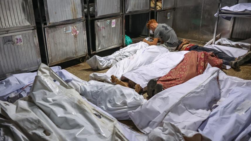বেইত লাহিয়ায় ত্রাণ নিতে যেয়ে ইসরায়েলি সেনার গুলিতে নিহতদের মরদেহ। ছবি: এএফপি