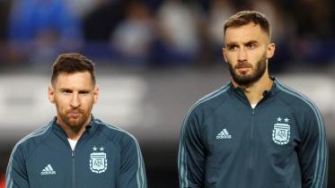 messi_and_pezzella.jpg